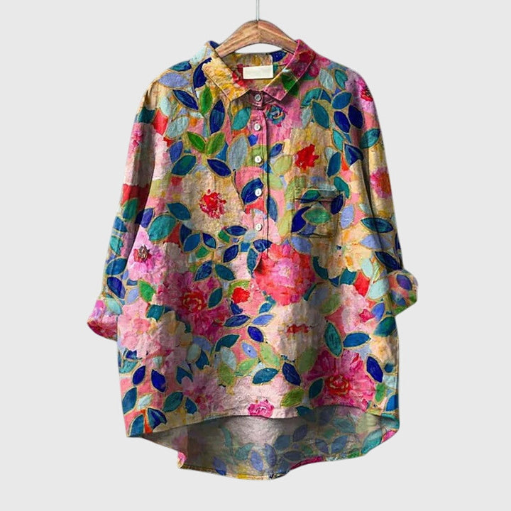 Womens elegant floral print blouse, long sleeve, round neck, versatile for office to casual wear.