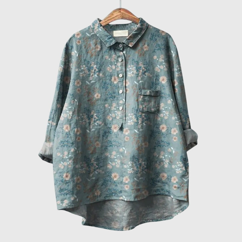 Versatile women's blouse with long sleeves & round neck, delicate floral print, elegant yet casual.