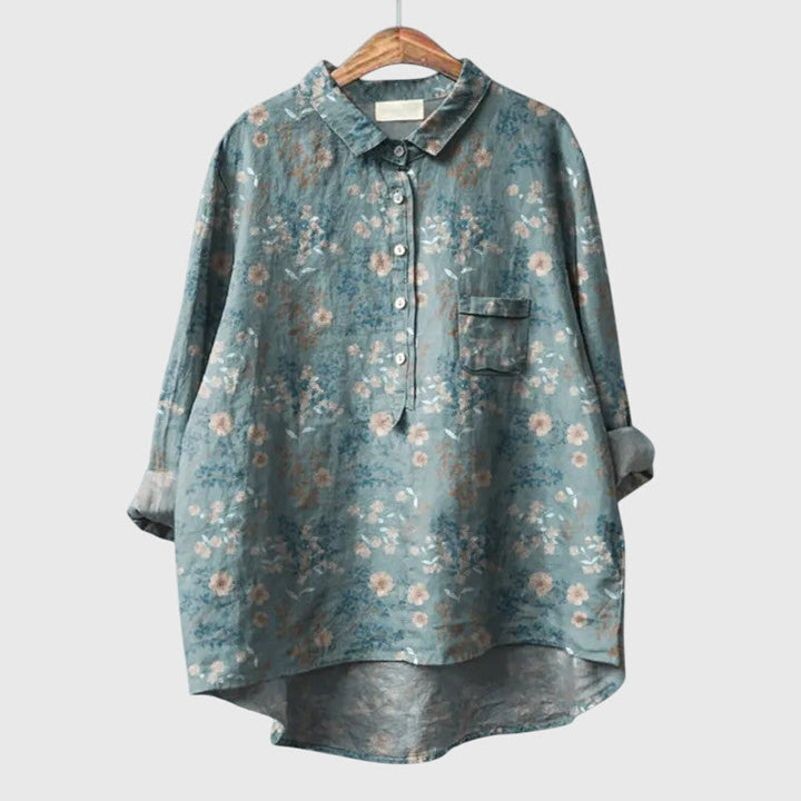 Versatile women's blouse with long sleeves & round neck, delicate floral print, elegant yet casual.