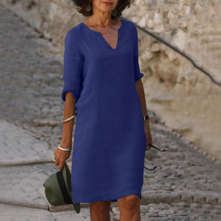 Women's casual linen V-neck dress, comfortable and elegant for summer, perfect for warm weather fashion.