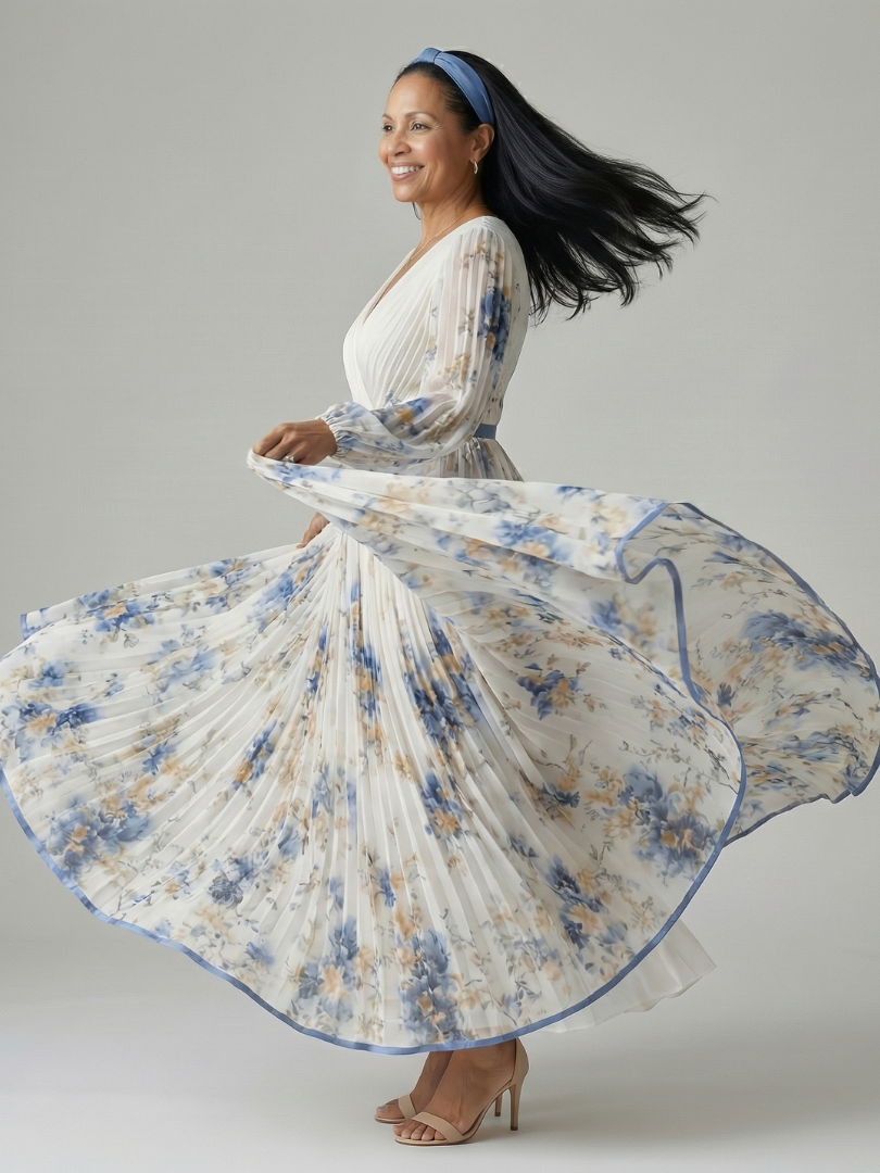 Elegant women's pleated floral wrap midi dress, featuring a flattering silhouette & long sleeves for comfort.