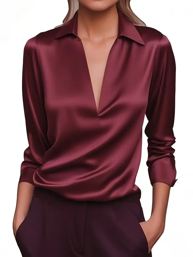 Navy women's long sleeve V-neck collared top, professional and elegant workwear.