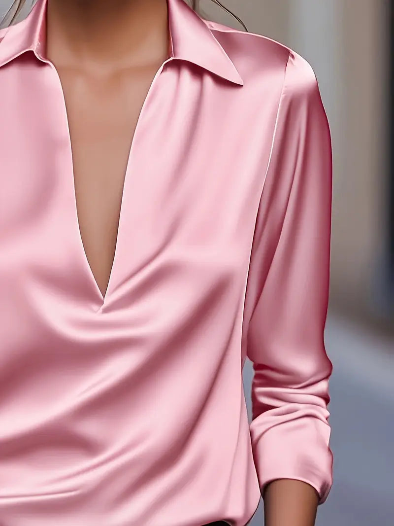 Pink women's long sleeve blouse, V-neck, collared, a chic and versatile fashion piece.