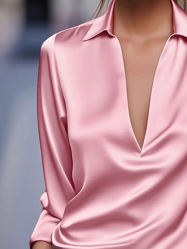 Feminine women's long sleeve V-neck blouse, collared, elegant for everyday style.