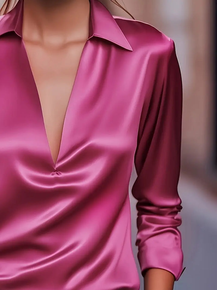 Women's sophisticated long sleeve V-neck collared shirt, professional & stylish.