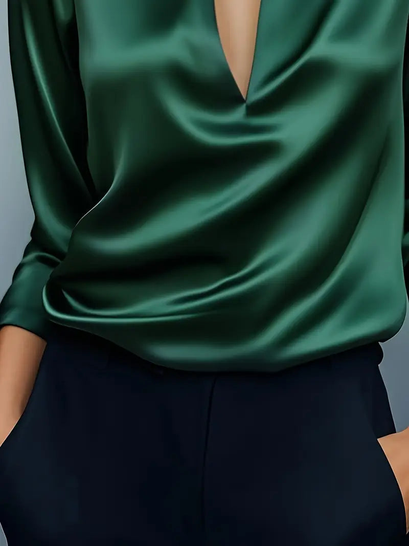 Blue women's long sleeve collared V-neck blouse, perfect for professional settings.