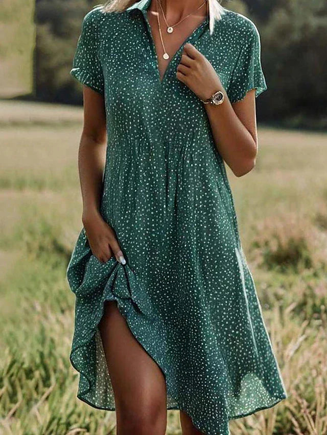 Women's elegant midi shirt dress with classic button-down front & short sleeves, perfect for chic summer fashion.
