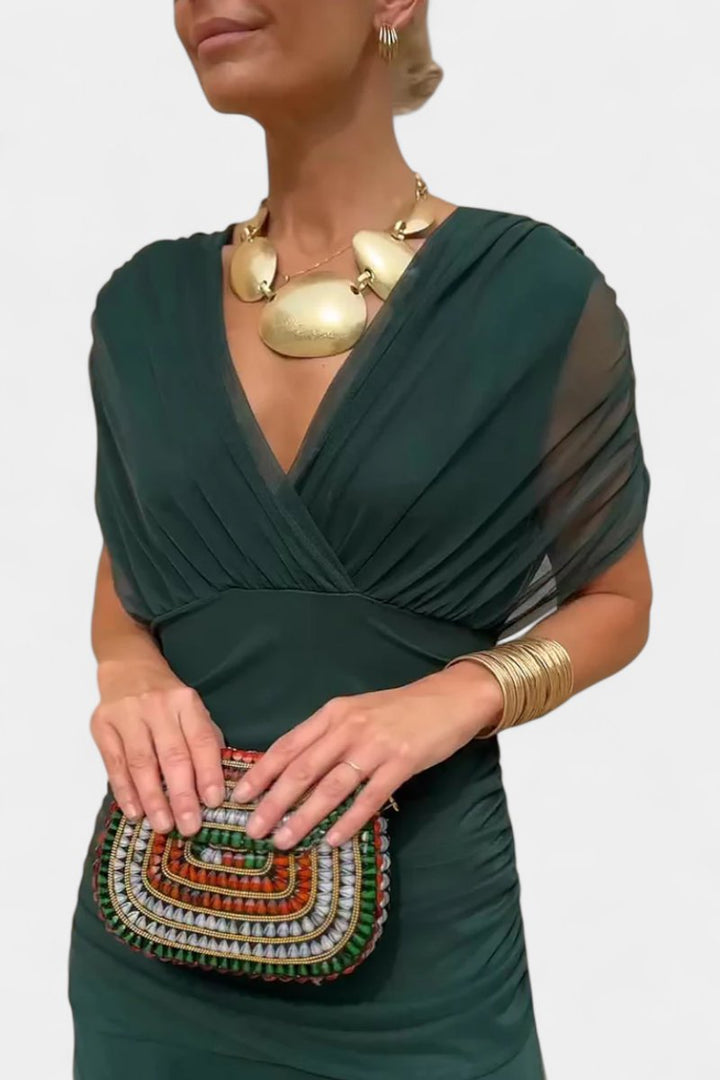 Women's off-shoulder formal maxi gown, a flowing elegant dress for evening events.