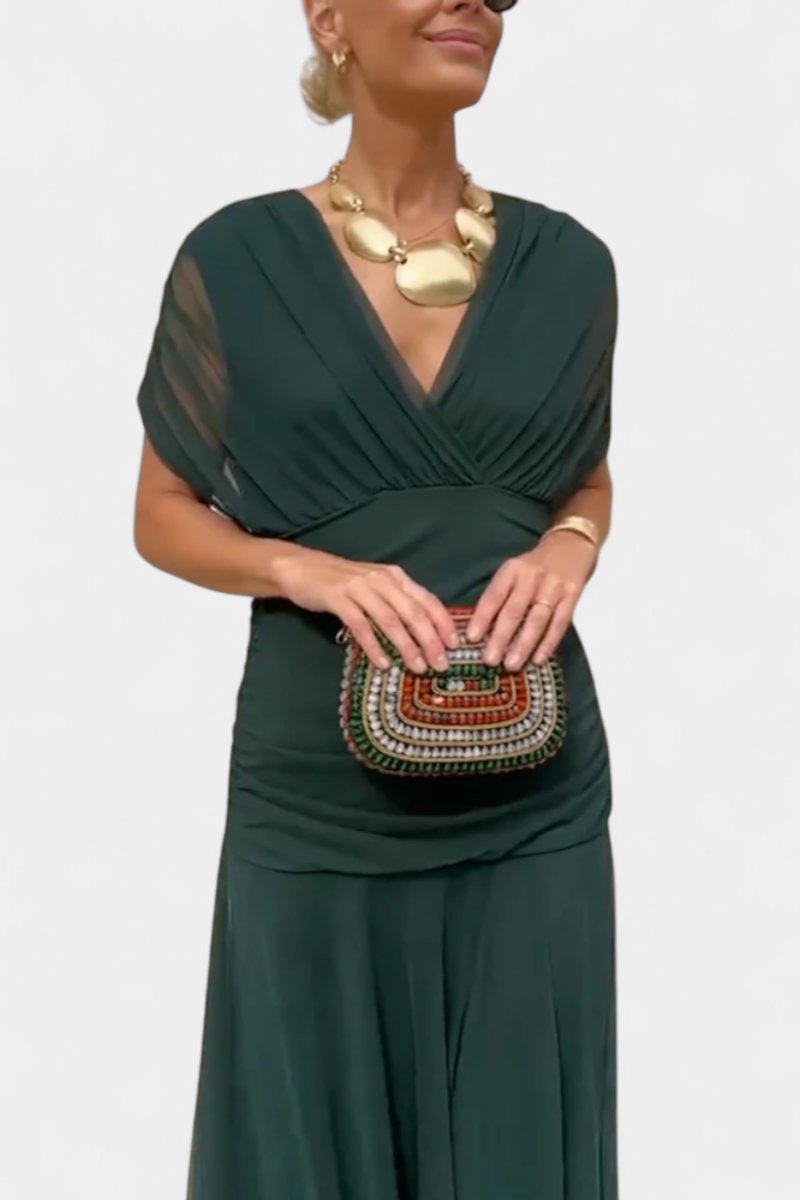 Stylish brown off-shoulder flowing maxi dress, perfect for women's cocktail parties.