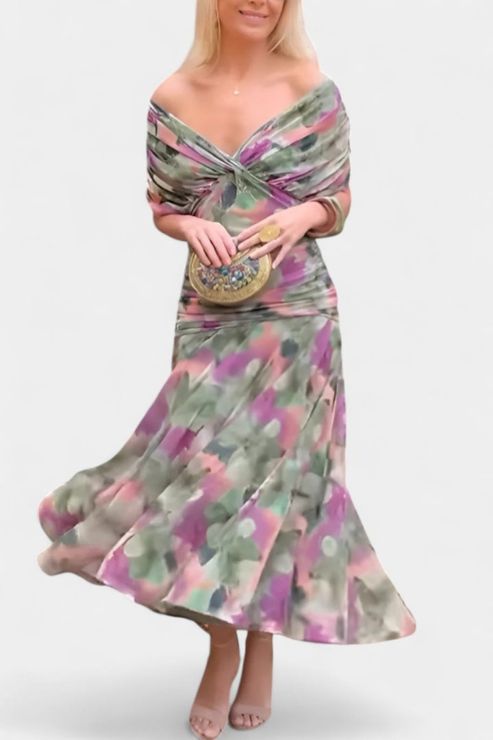 Women's off-shoulder purple maxi evening gown, a stylish flowing dress for special occasions.