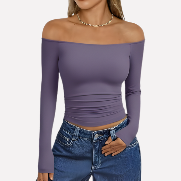 Sophisticated women's off-shoulder long sleeve top. Stylish blouse, comfortable for ladies' fashion.