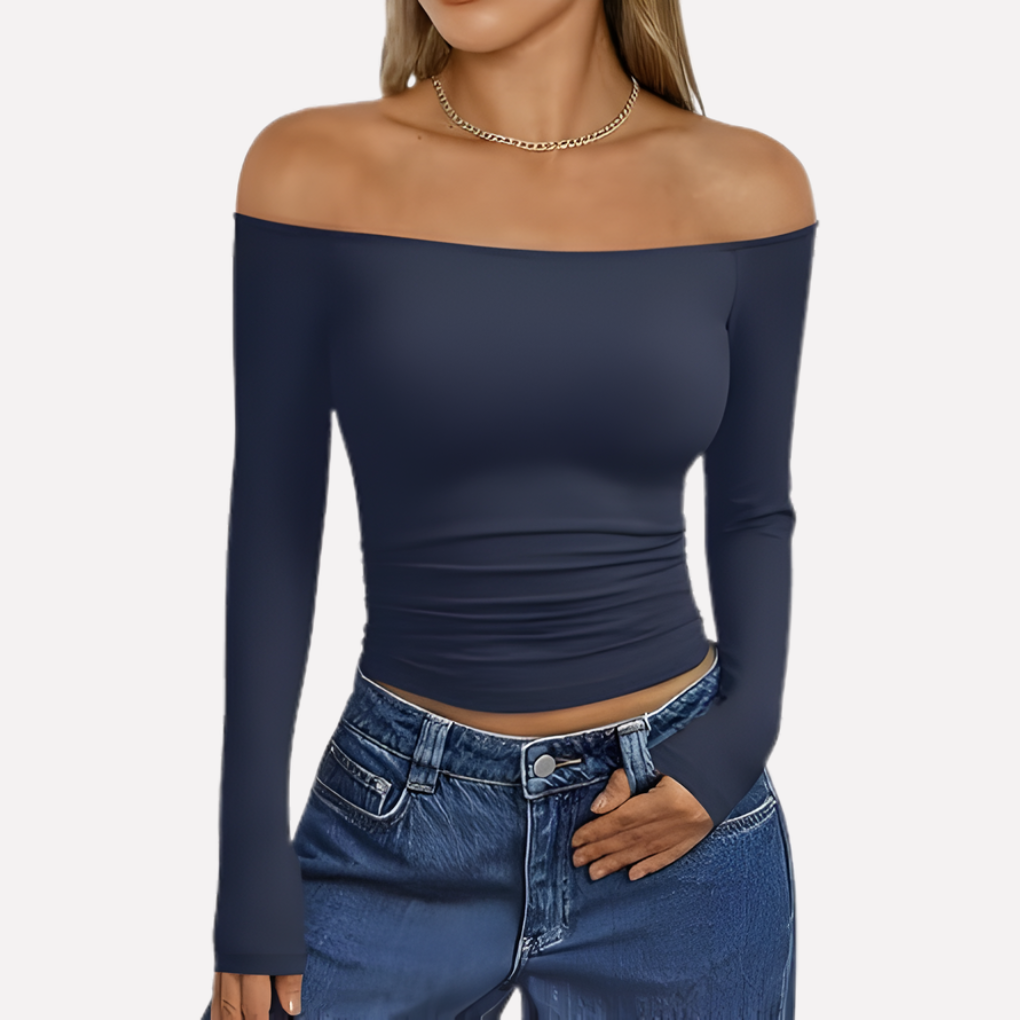 Timeless women's off-shoulder long sleeve top. Elegant, comfortable, and versatile for any casual event.