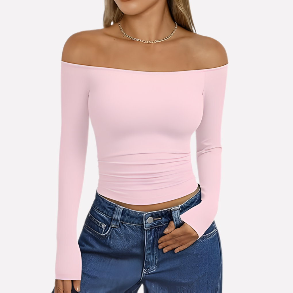 Trendy women's off-shoulder long sleeve top. Stylish blouse for ladies, perfect for a chic casual look.