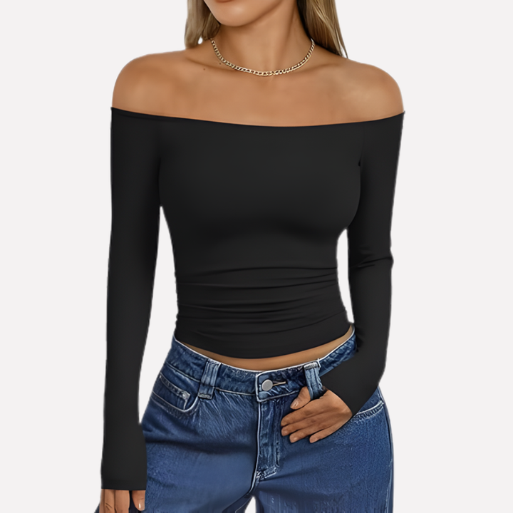 Chic women's off-shoulder long sleeve top. Elegant and versatile casual shirt for modern ladies.