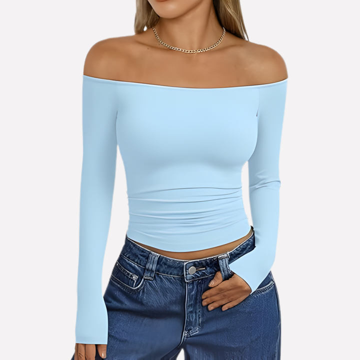 Ladies' elegant off-shoulder long sleeve top. Comfortable and stylish for casual or formal occasions.