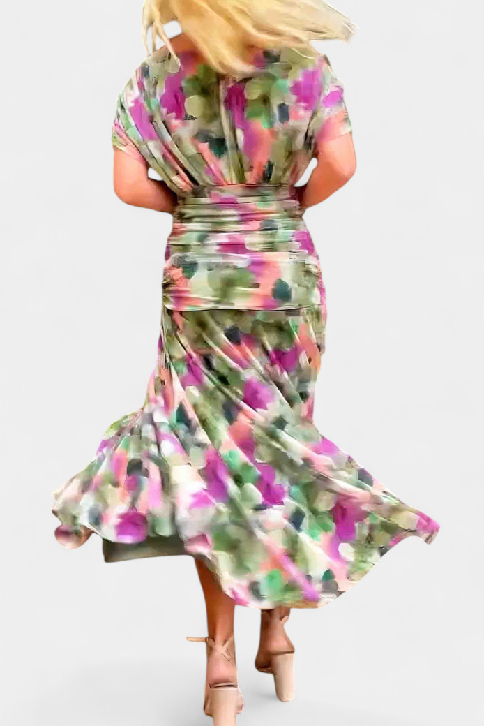 Chic women's off-shoulder maxi dress, a colorful printed gown for elegant evening occasions.