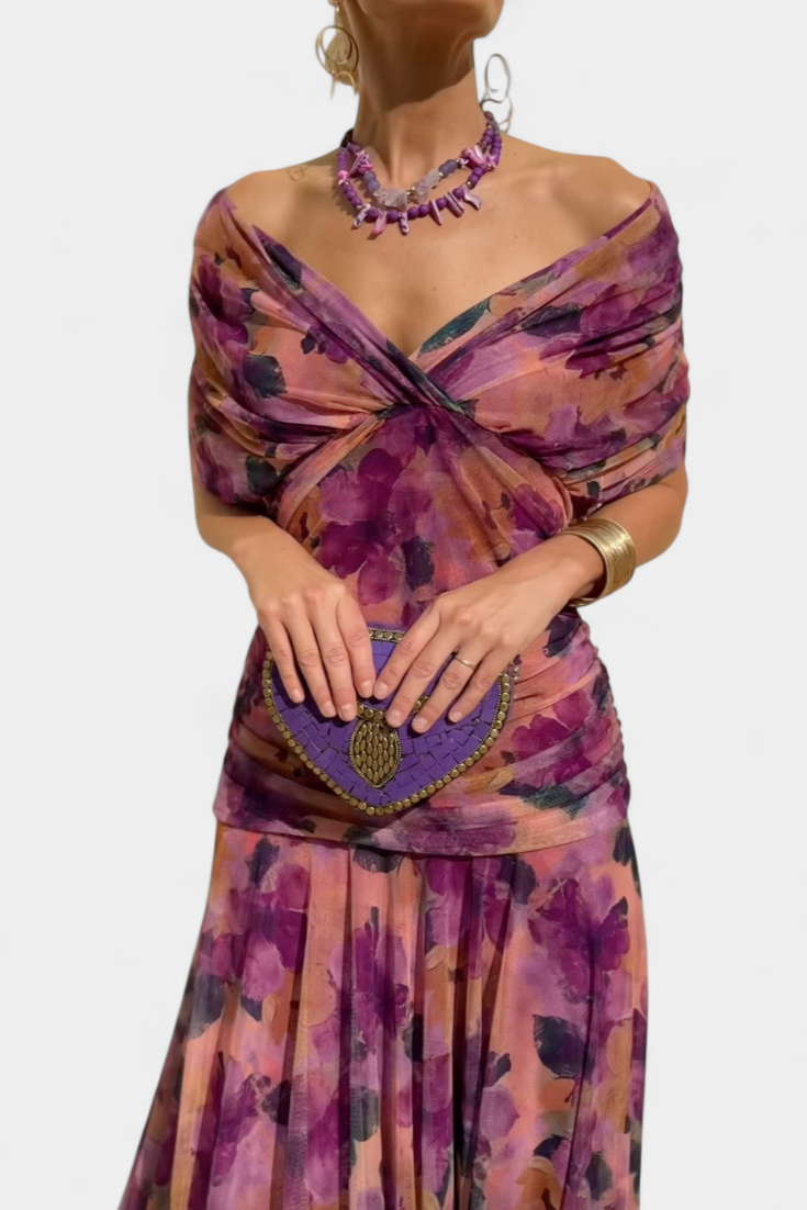 Graceful women's off-shoulder long dress, with a colorful print, perfect for formal evening parties.