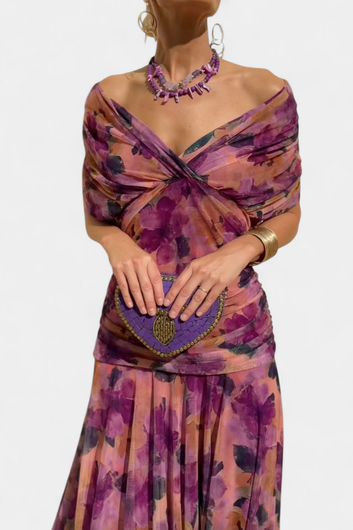 Graceful women's off-shoulder long dress, with a colorful print, perfect for formal evening parties.