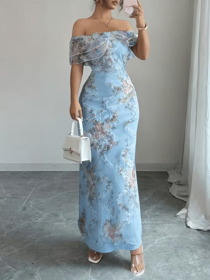 Women's elegant off-shoulder maxi dress with delicate floral embroidery, perfect for evening or special occasions.