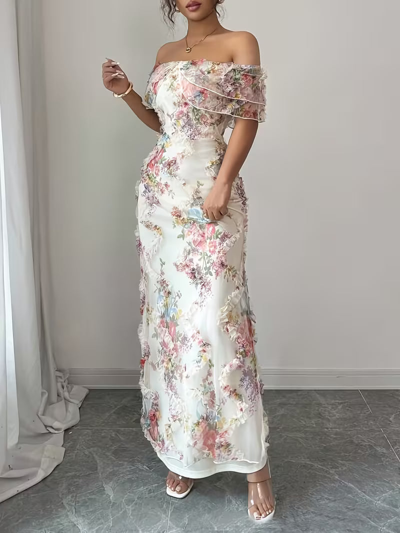 Women's off-shoulder maxi evening dress featuring intricate floral embroidery, an elegant and timeless piece.