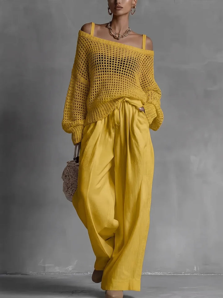 Soft fabric women's off-shoulder two-piece set, ideal for comfortable summer fashion. Elegant relaxed fit.