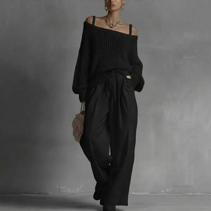 Woman wearing a chic off-shoulder two-piece set, showcasing its elegant and casual summer style.