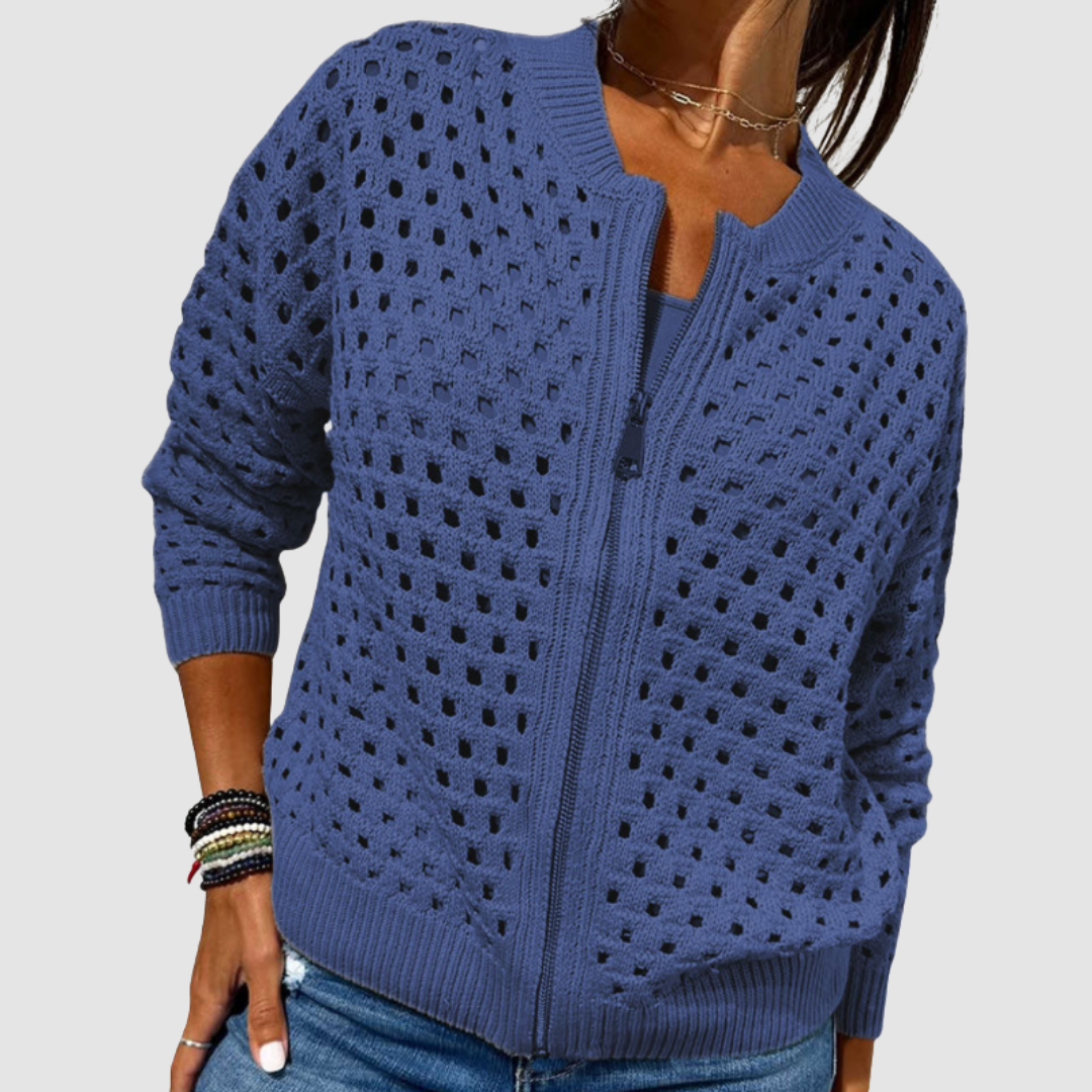 Woman modeling a comfortable open-knit cardigan, showcasing its relaxed fit & versatile fashion appeal.