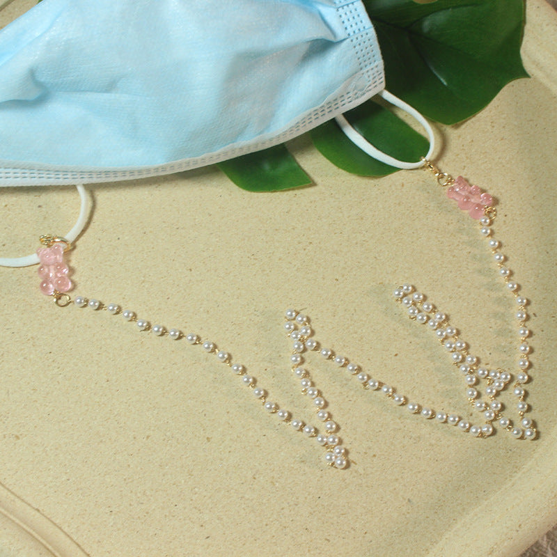 Delicate pearl spectacle strap, a secure and stylish women's accessory.