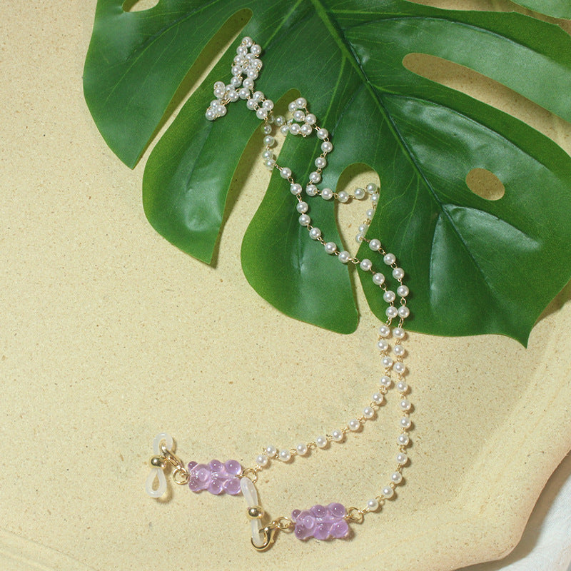 Elegant women's pearl eyewear holder, perfect for daily use & style.