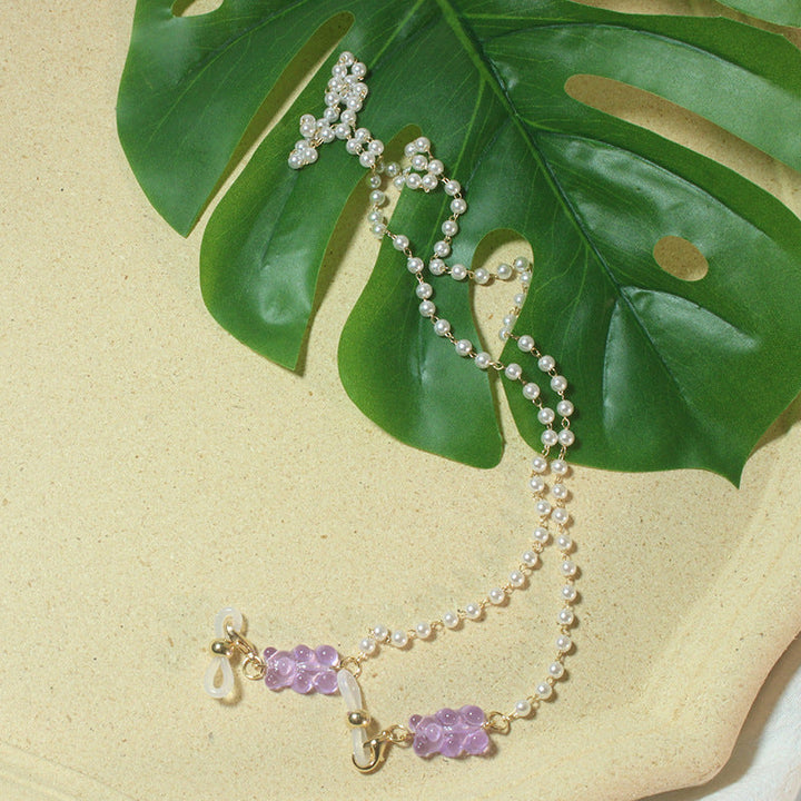 Elegant women's pearl eyewear holder, perfect for daily use & style.
