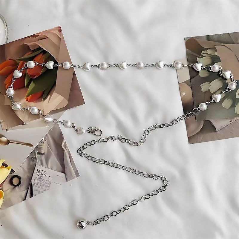 Adjustable stainless steel women's pearl necklace, featuring elegant heart pendants, ideal for any occasion.