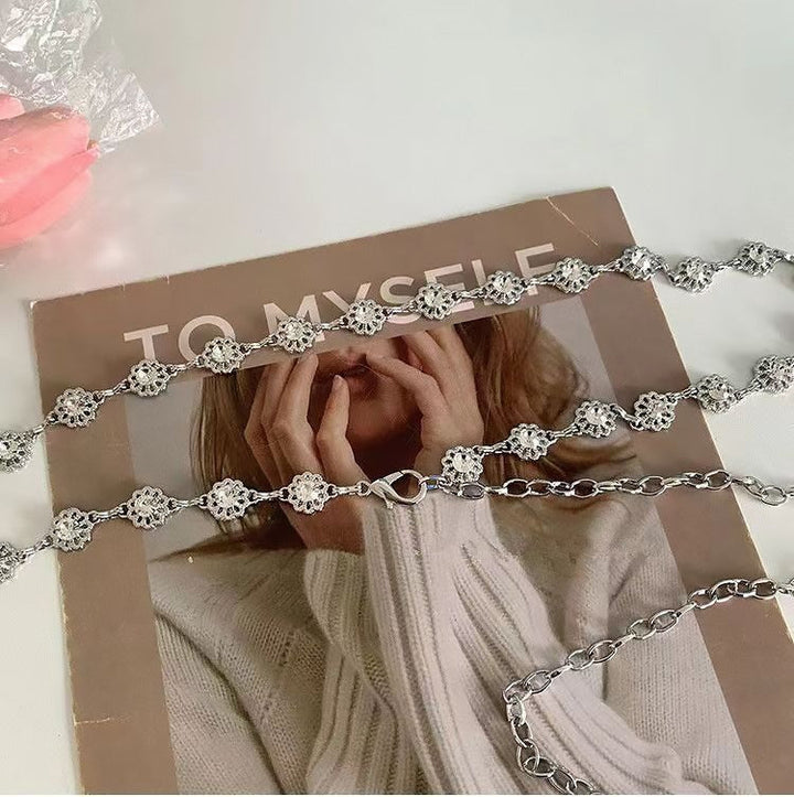 Versatile elegant pearl necklace for women, with dainty heart pendants, suitable for daily wear or special events.