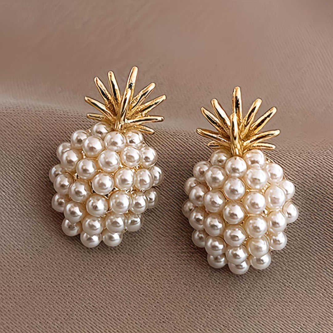 Women's elegant pearl pineapple drop earrings, a charming tropical accessory.