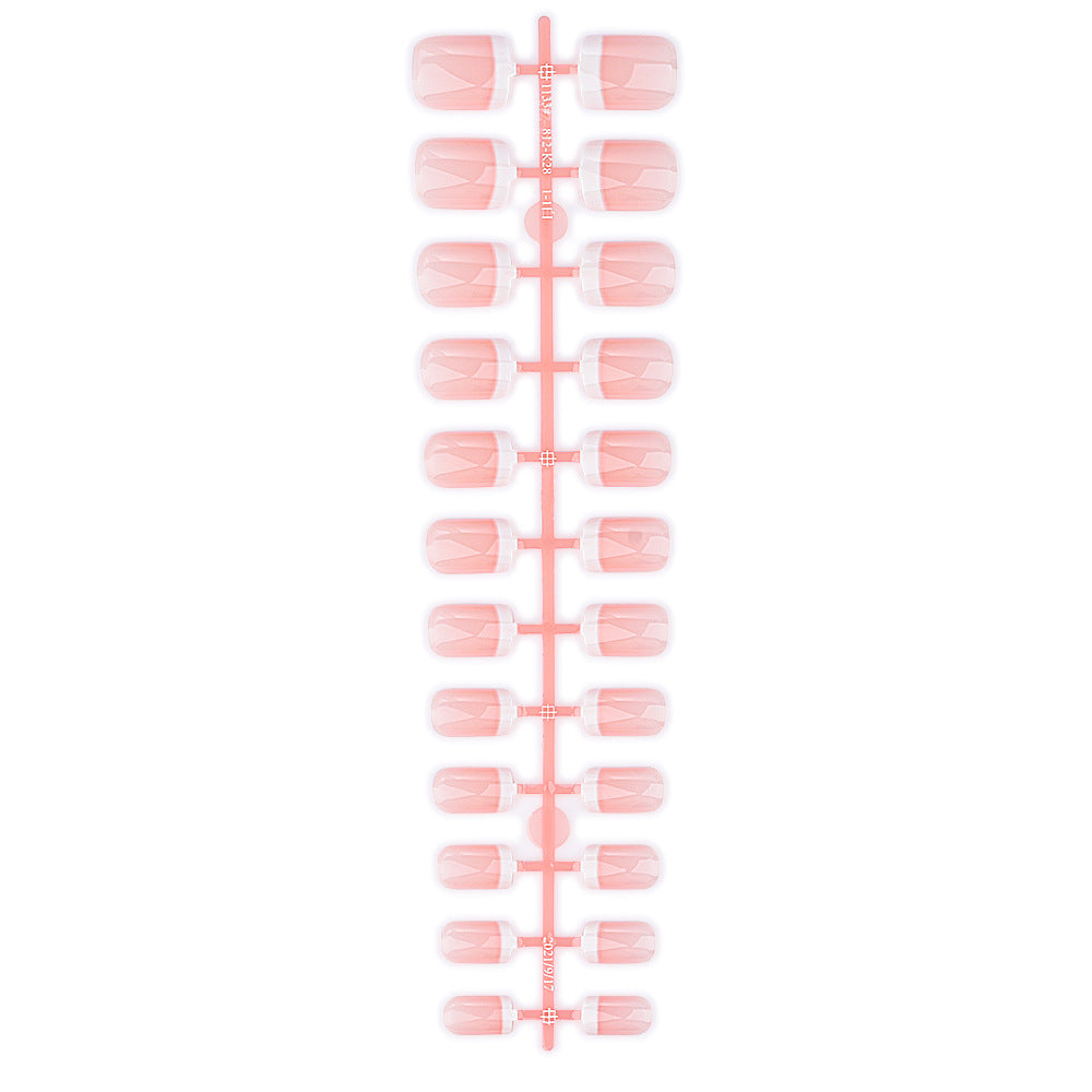 Beautiful women's fake nails with a pink French tip design, ideal for an instant beauty upgrade.