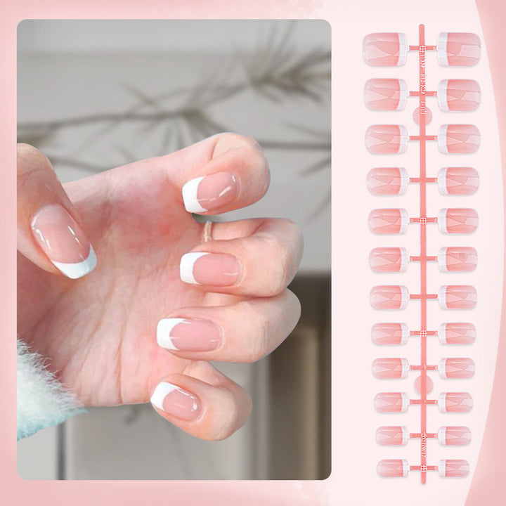 Glossy pink French tip press-on nails for women, offering a salon-quality manicure & easy application.