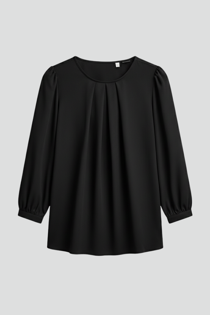 Women's elegant pleated blouse with chic puff sleeves & round neck, perfect for spring fashion.