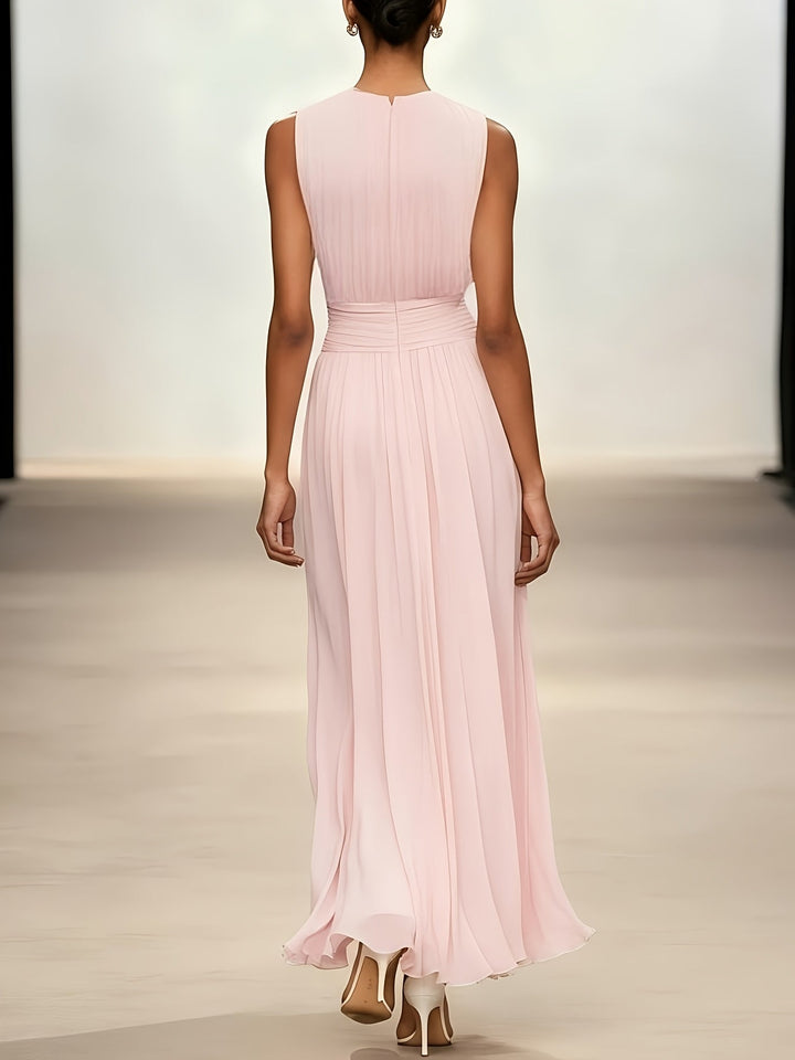 Beautiful women's long pleated dress with a stylish ruched waist, elegant and flowy, great for summer events.