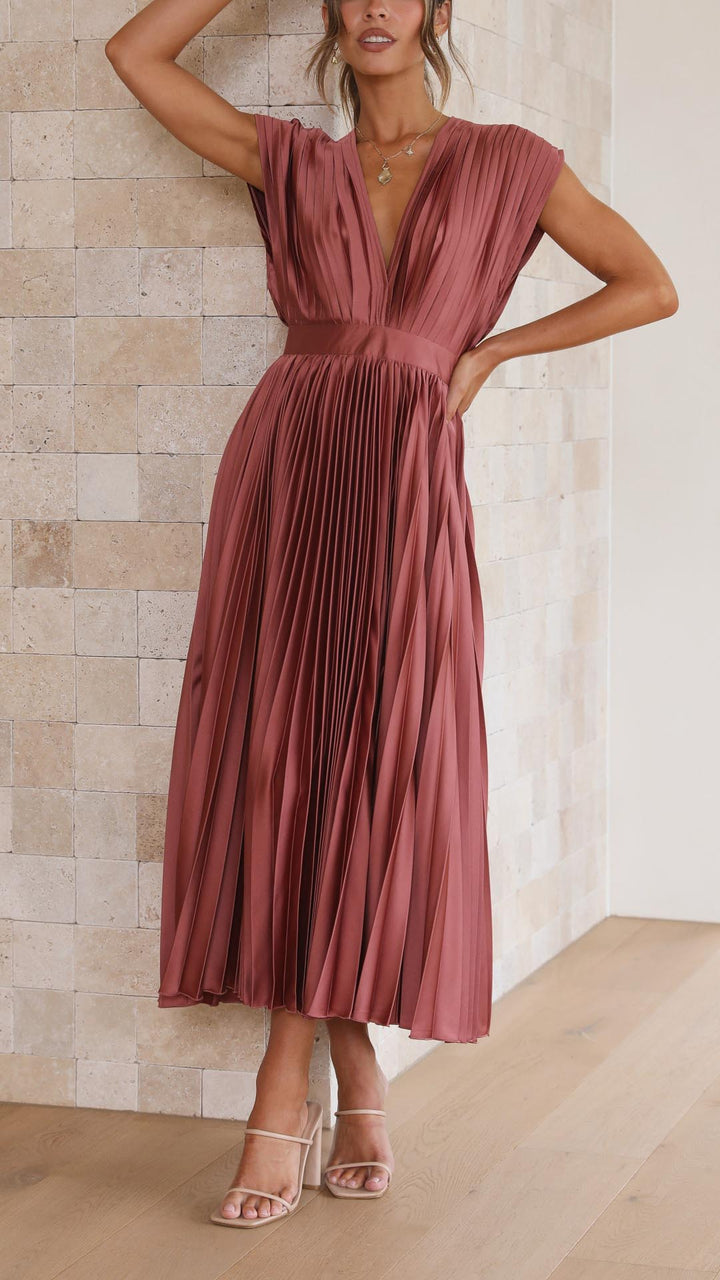 Comfortable & elegant V-neck pleated midi dress for women, offering a flattering silhouette.