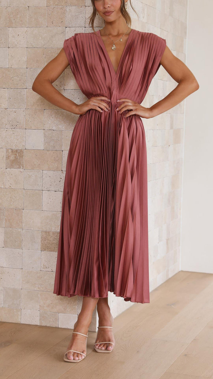 Women's elegant pleated V-neck midi dress, perfect for a wedding guest or formal occasion.