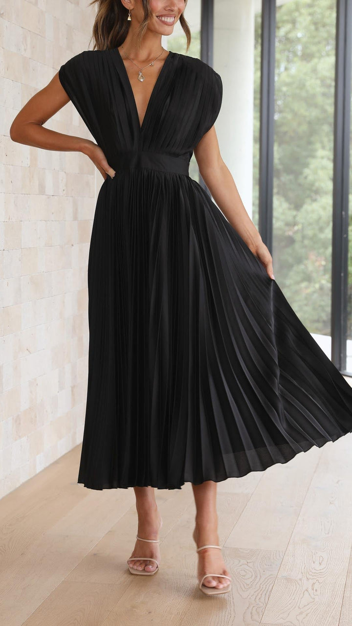 Women's stylish pleated V-neck midi dress with cap sleeves for weddings.