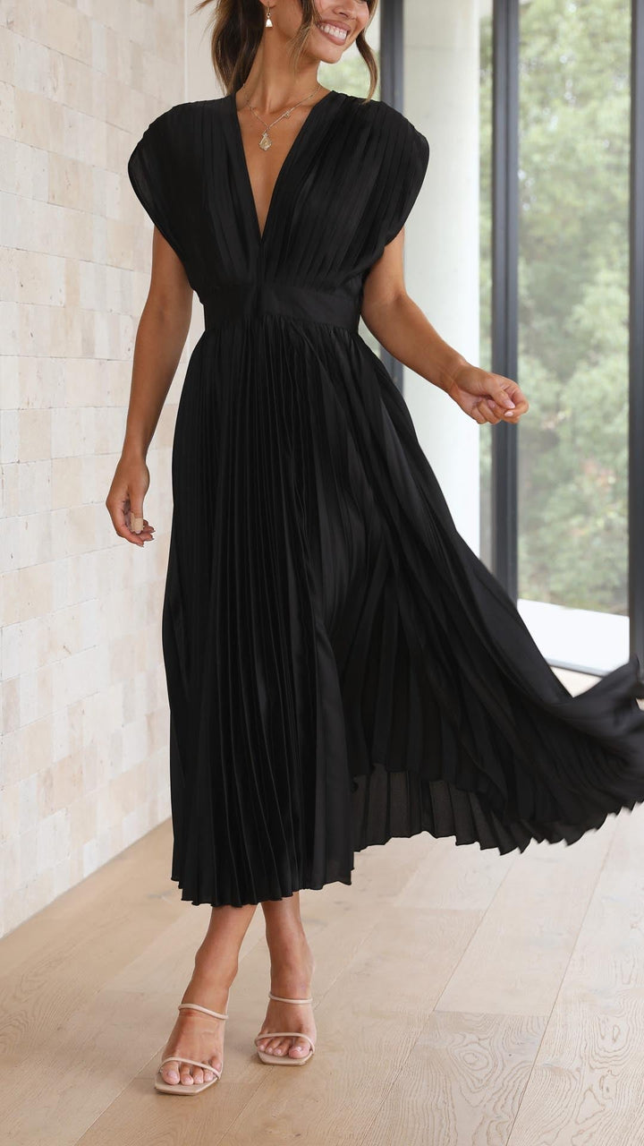 Wedding guest women's V-neck midi dress, elegantly pleated with cap sleeves.