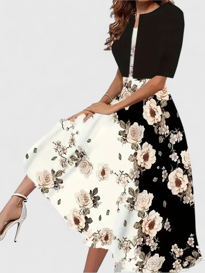 Sophisticated women's printed A-line midi dress with three-quarter sleeves, great for elegant occasion wear.