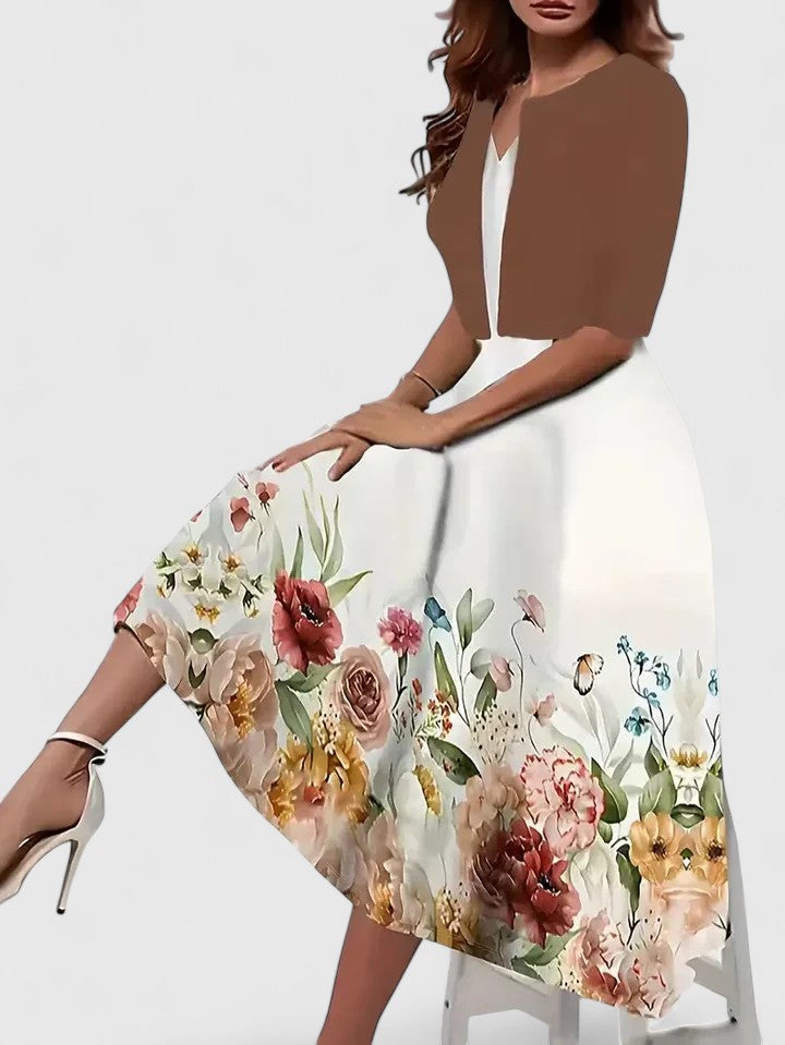 Vibrant printed A-line midi dress for women, with three-quarter sleeves, suitable for parties & casual wear.