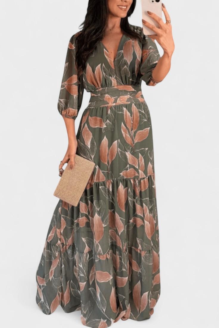 Women's elegant printed maxi dress with a flattering V-neck and flowing style, perfect for versatile fashion.