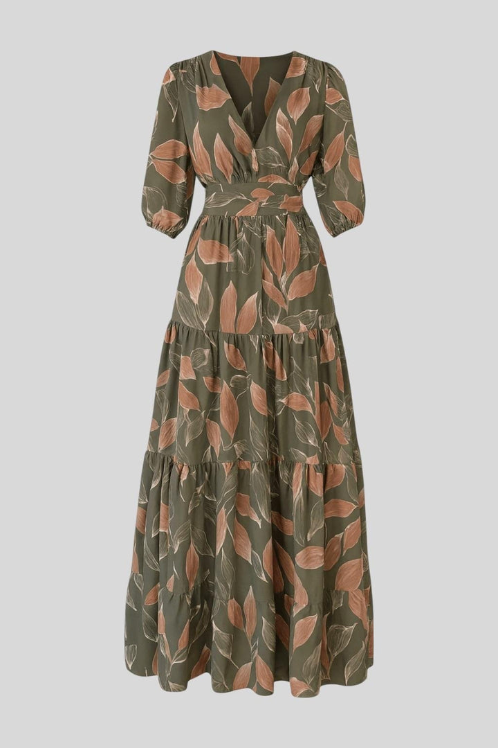 Chic women's V-neck maxi dress with a vibrant print and flowing silhouette, ideal for summer or autumn.