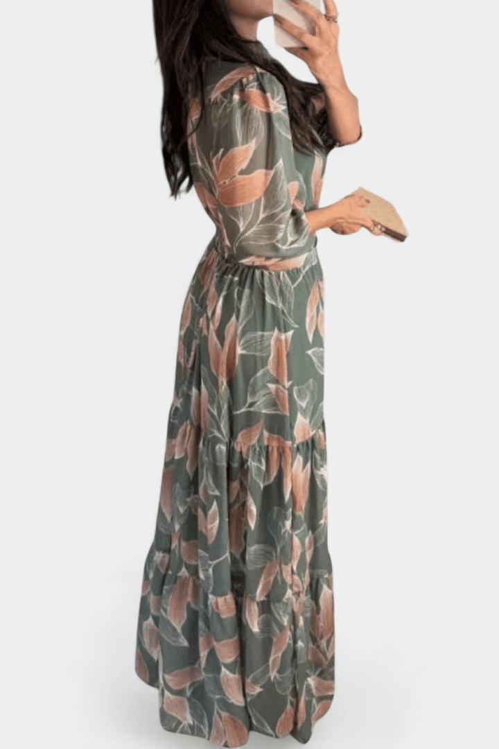 Feminine long-sleeve printed maxi dress, offering an elegant flowing style for a comfortable, chic look.