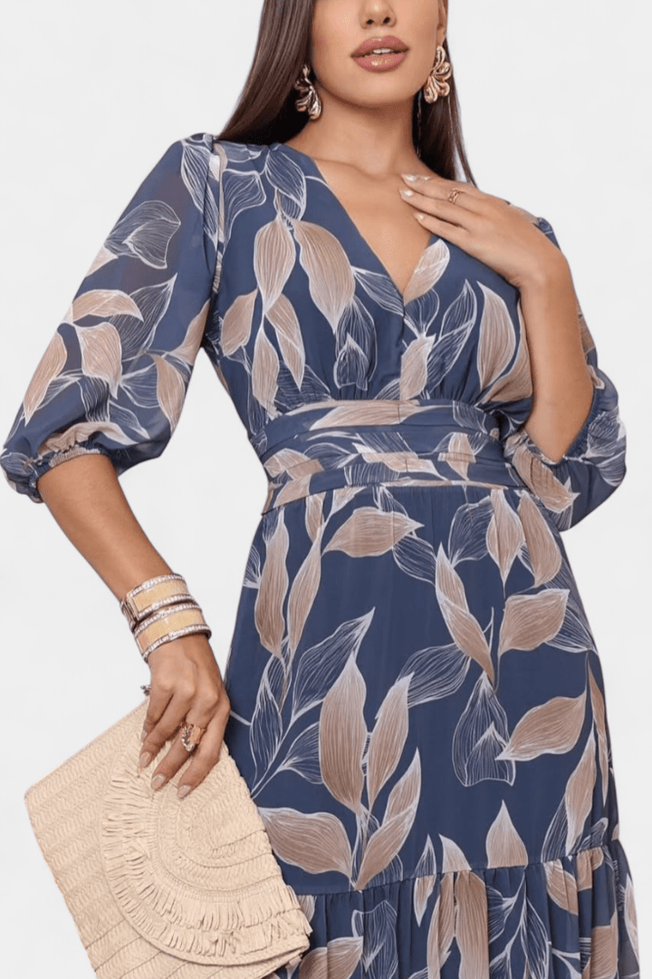 Versatile women's elegant maxi dress featuring a V-neck and a beautiful print, suitable for casual or dressy occasions.