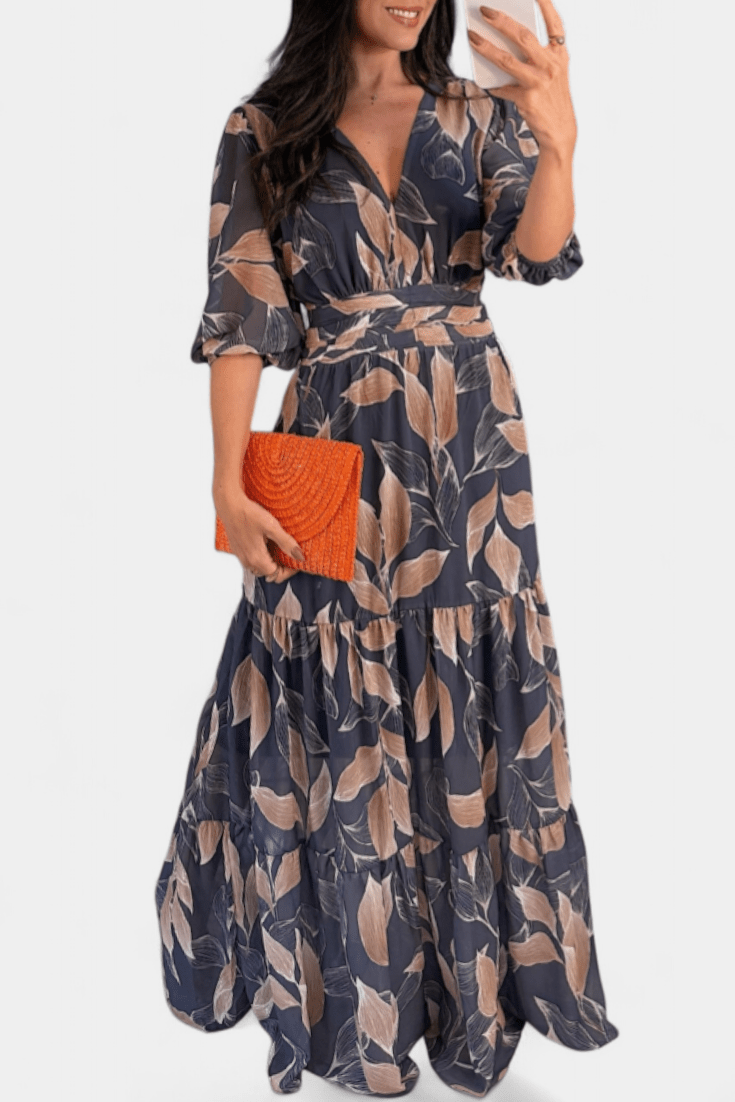 Chic women's printed maxi dress with a gracefully flowing silhouette and a stylish V-neck for any season.
