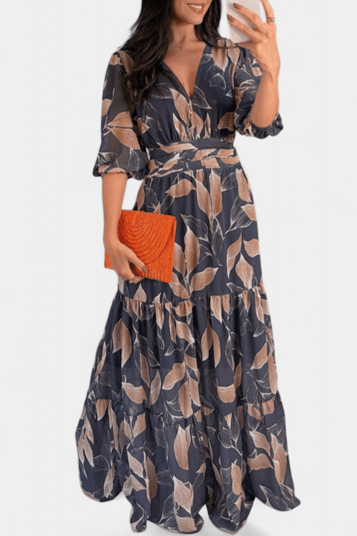 Chic women's printed maxi dress with a gracefully flowing silhouette and a stylish V-neck for any season.