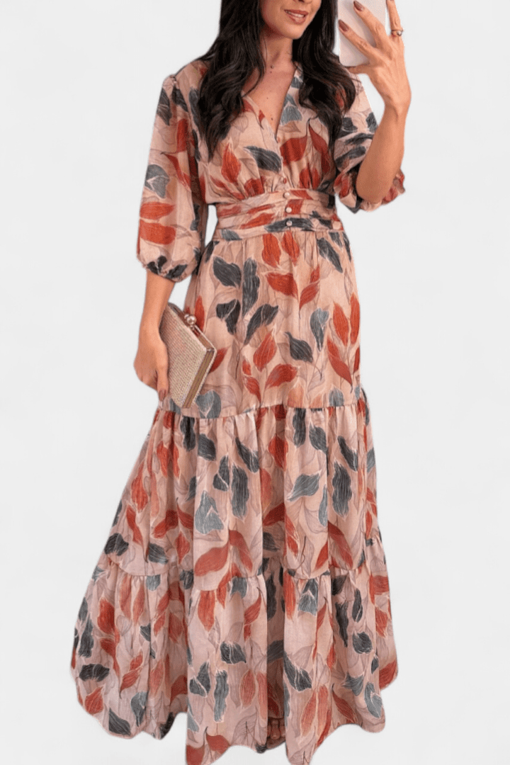 Feminine V-neck maxi dress for women, featuring a vibrant print and a flowing, elegant design for ultimate comfort.